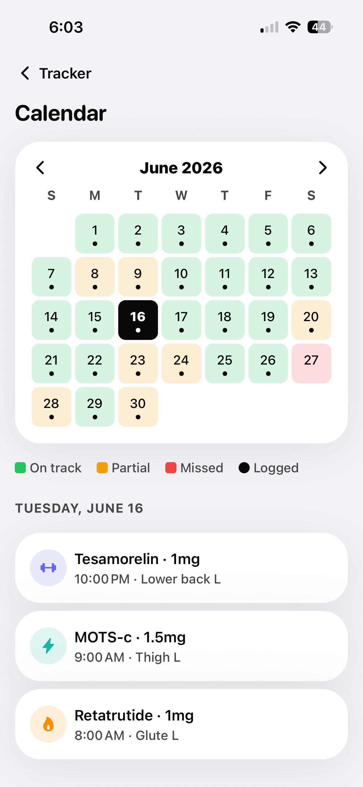 Month calendar with scheduled and logged dose days